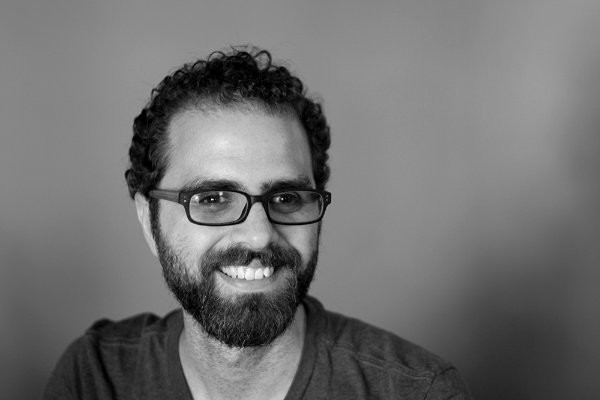 Look at this and picture someone slightly older, grayer, and with updated glasses.